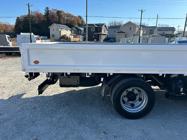 キャンター ワイドキャブロング全低床 1年保証付き 4t ワイド超ロング AT車 ディーゼルターボ 荷台鉄板 ナビ バックカメラ ETC Bluetooth 電格ミラー 坂道発進補助装置 4トン 4トントラック ワイドロング 積載4.2t(71枚目)