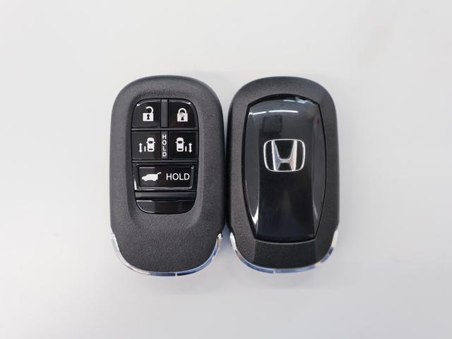 ステップワゴン スパーダ　両ＰＳＤ　Ｐテールゲート　オットマン　キーレスエントリー　両側Ｐスライドドア　ターボ車　パワーステアリング　オートエアコン　サイドカーテンエアバック　Ａクルーズ　記録簿　盗難防止装置　横滑り防止装置（39枚目）