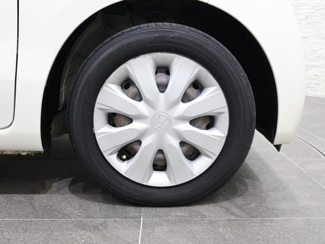 N-WGN G・Lパッケージ 純正ナビ バックカメラ 横滑り防止 ETC ハロゲンライト ナビTV Aストップ VSA ワンセグ シートヒーター イモビライザー スマートキー オートエアコン USB DVD 運転席助手席エアバッグ(27枚目)