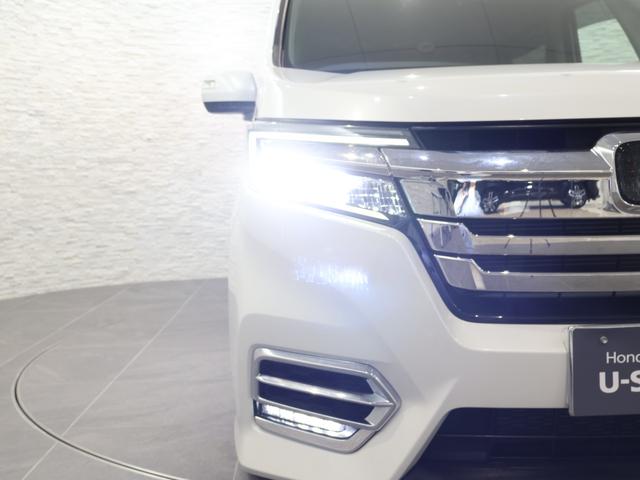 ステップワゴンスパーダ ｅ：ＨＥＶスパーダＧホンダセンシング　社外ナビ　バックカメラ　両側パワースライドドア　フリップダウン　ＥＴＣ　ＬＥＤライト　フォグ　セキュリティアラーム　横滑り防止装置　クルーズコントロール　フルセグ　ＤＶＤ再生可能　ナビ＆ＴＶ　キーレス（31枚目）