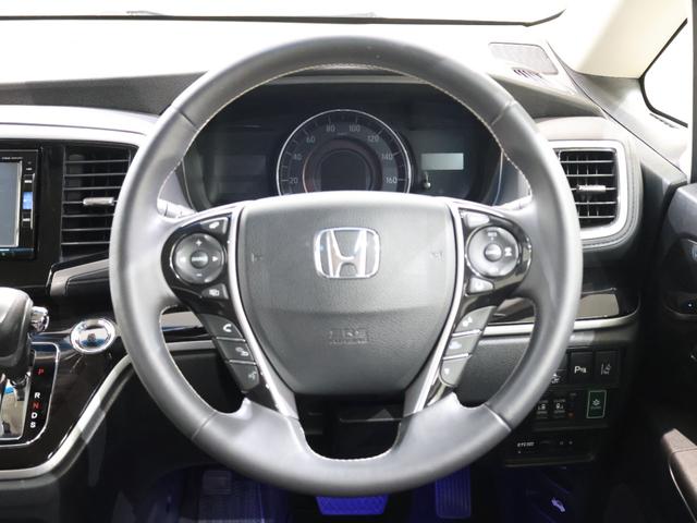 オデッセイ アブソルート・EXホンダセンシング 純正ナビ マルチビューカメラ 両側パワースライドドア パーキングセンサー パーキングアシスト 電動シート シートヒーター オットマンシート フルセグテレビ 360°カメラ 横滑り防止装置 Pシート(6枚目)