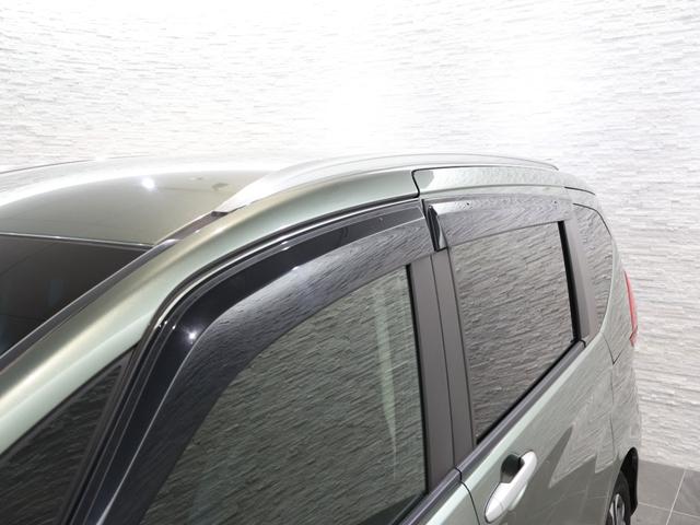 フリード+ハイブリッド ハイブリッド・クロスターホンダセンシング 純正ナビ バックカメラ 両側パワースライドドア 前後ドラレコ ETC LEDライト フォグ ルーフレール 地デジフルセグ 両側電動ドア LEDヘッドライト スマートキー 横滑り防止装置 整備記録簿(29枚目)