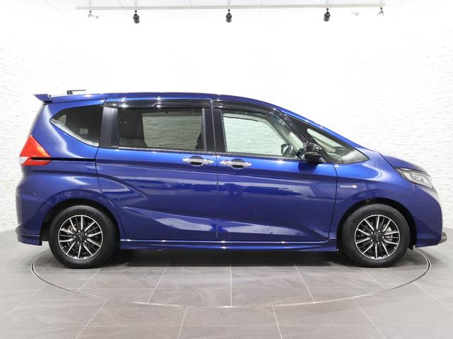 フリードハイブリッド ハイブリッド・モデューロＸホンダセンシング　純正ナビ　オートクルーズコントロール　ＬＥＤライト　フルオートエアコン　追突軽減Ｂ　ＥＴＣ車載器　リヤカメラ　ＤＶＤ再生可　フルセグ　エアバッグ　スマートキー　アイドリングストップ　ＶＳＡ　イモビ（27枚目）