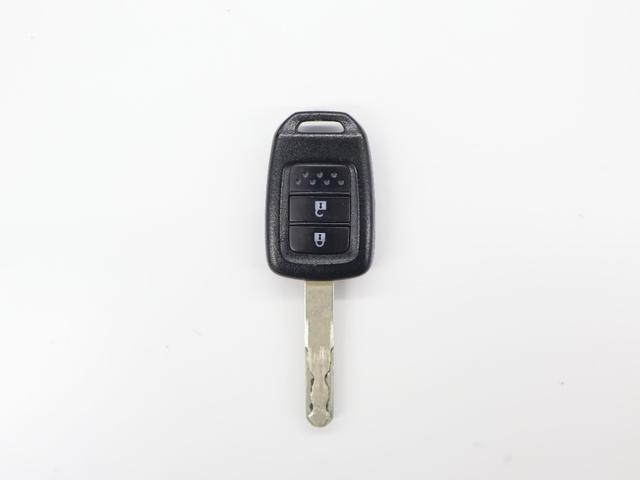 N-VAN G・ホンダセンシング 社外ナビ ワンセグTV 横滑り防止 ETC ハロゲンライト 純正SW 前後誤発進抑制機能 定期点検記録簿 ダブルエアバック パワーウインド 盗難防止システム キーレスキー パワステ フルオートエアコン(27枚目)