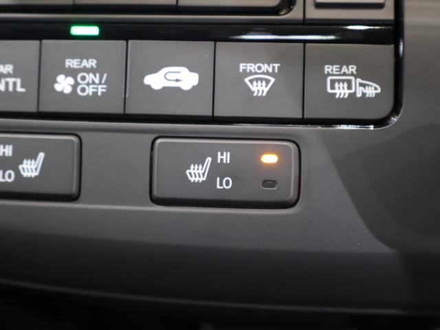 ステップワゴンスパーダ ｅ：ＨＥＶスパーダＧ・ＥＸホンダセンシング　純正ナビ　バックカメラ　両側パワースライドドア　わくわくゲート　シートヒーター　ＥＴＣ　ＬＥＤライト　フォグ　社外ＡＷ　エアバック　地デジ　クルコン　サイドエアバッグ　シ－トヒ－タ－　衝突軽減システム（10枚目）