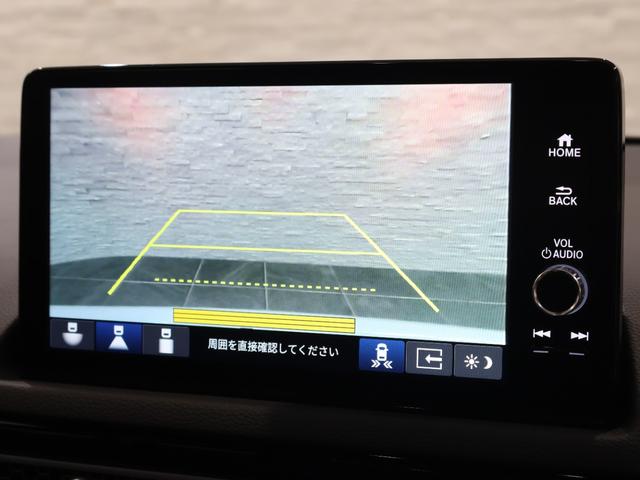 シビック ｅ：ＨＥＶＥＸ　当社デモカー　純正ホンダコネクトディスプレイ　バックカメラ　パーキングセンサー　ブラインドスポットインフォメーション　電動シート　シートヒーター　電動サンルーフ　ＥＴＣ　ＬＥＤライト　Ｂカメラ　ＥＳＣ（5枚目）