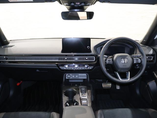 シビック ｅ：ＨＥＶＥＸ　当社デモカー　純正ホンダコネクトディスプレイ　バックカメラ　パーキングセンサー　ブラインドスポットインフォメーション　電動シート　シートヒーター　電動サンルーフ　ＥＴＣ　ＬＥＤライト　Ｂカメラ　ＥＳＣ（6枚目）
