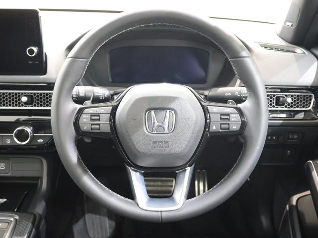 シビック ｅ：ＨＥＶＥＸ　当社デモカー　純正ホンダコネクトディスプレイ　バックカメラ　パーキングセンサー　ブラインドスポットインフォメーション　電動シート　シートヒーター　電動サンルーフ　ＥＴＣ　ＬＥＤライト　Ｂカメラ　ＥＳＣ（7枚目）