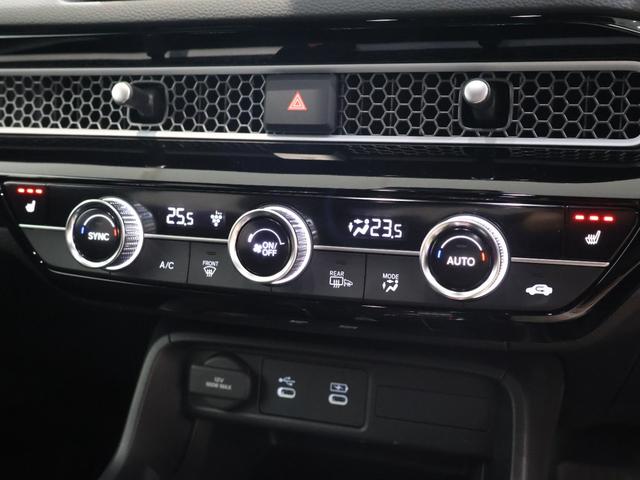 シビック ｅ：ＨＥＶＥＸ　当社デモカー　純正ホンダコネクトディスプレイ　バックカメラ　パーキングセンサー　ブラインドスポットインフォメーション　電動シート　シートヒーター　電動サンルーフ　ＥＴＣ　ＬＥＤライト　Ｂカメラ　ＥＳＣ（8枚目）