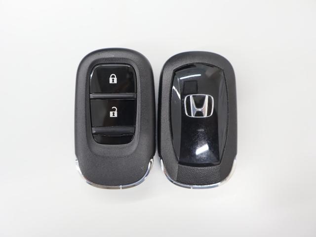 シビック ｅ：ＨＥＶＥＸ　当社デモカー　純正ホンダコネクトディスプレイ　バックカメラ　パーキングセンサー　ブラインドスポットインフォメーション　電動シート　シートヒーター　電動サンルーフ　ＥＴＣ　ＬＥＤライト　Ｂカメラ　ＥＳＣ（34枚目）