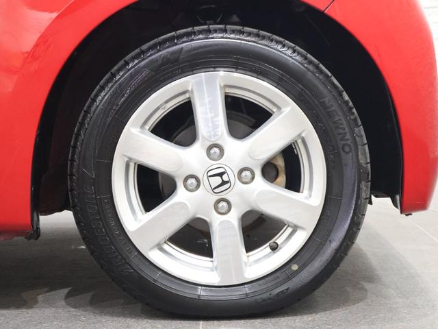 N-ONE プレミアム 社外ナビ バックカメラ 軽減ブレーキ 踏み間違い防止 横滑り防止 ETC HIDライト フォグ 純正AW スマートキー DVD再生機能 クルコン 運転席エアバック 横滑防止 イモビライザー 地デジ(24枚目)