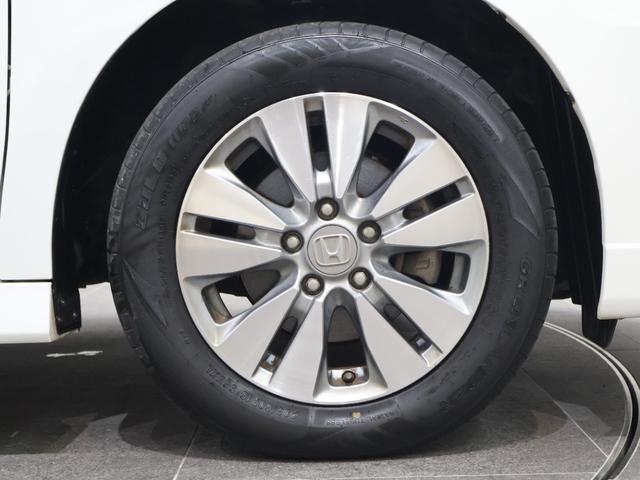 ステップワゴンスパーダ Z 純正ナビ バックカメラ 両側パワースライドドア フリップダウンモニター クルーズコントロール 横滑り防止 アイドリングストップ ETC HIDライト フォグ 純正AW スマートキー 横滑防止 イモビ(28枚目)