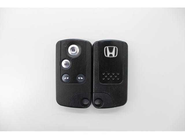 ステップワゴンスパーダ Z 純正ナビ バックカメラ 両側パワースライドドア フリップダウンモニター クルーズコントロール 横滑り防止 アイドリングストップ ETC HIDライト フォグ 純正AW スマートキー 横滑防止 イモビ(30枚目)