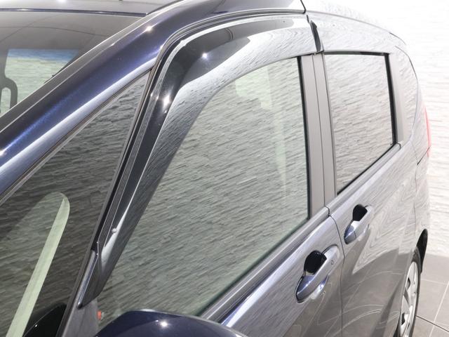 フリードハイブリッド ハイブリッド・Gホンダセンシング 純正ナビ バックカメラ 両側パワースライドドア 横滑り防止 シートヒーター ETC LEDライト 軽減ブレーキ キーフリーシステム DVD再生可能 ECON 後カメラ Aクルーズ 地デジフルセグTV(27枚目)