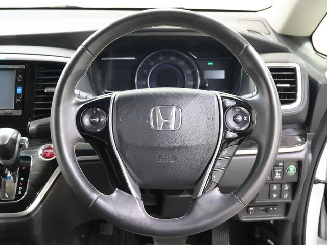 オデッセイハイブリッド ハイブリッドアブソルート・ホンダセンシング 純正ナビ バックカメラ 両側パワースライドドア 電動シート オットマン ウォークスルー ETC LEDライト フォグ 純正AW スマートキー サイドカーテンエアバック リアカメラ Pシート ABS(6枚目)