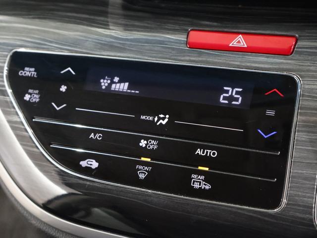 オデッセイハイブリッド ハイブリッドアブソルート・ホンダセンシング 純正ナビ バックカメラ 両側パワースライドドア 電動シート オットマン ウォークスルー ETC LEDライト フォグ 純正AW スマートキー サイドカーテンエアバック リアカメラ Pシート ABS(7枚目)