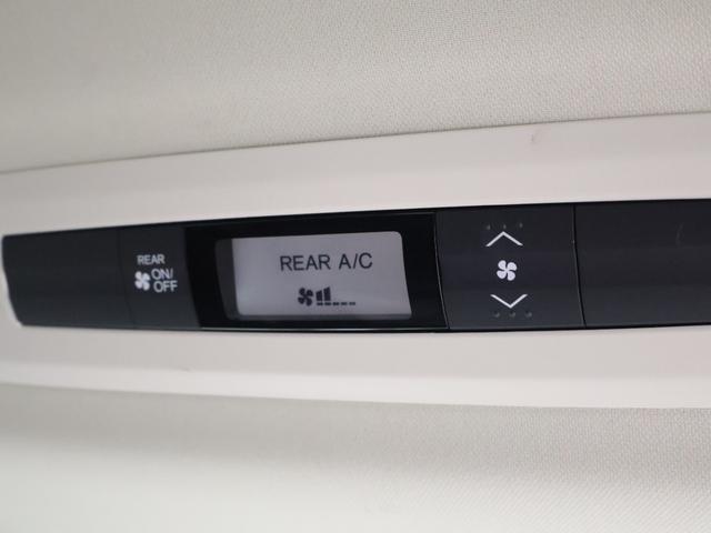 オデッセイハイブリッド ハイブリッドアブソルート・ホンダセンシング 純正ナビ バックカメラ 両側パワースライドドア 電動シート オットマン ウォークスルー ETC LEDライト フォグ 純正AW スマートキー サイドカーテンエアバック リアカメラ Pシート ABS(8枚目)