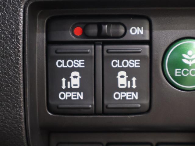 オデッセイハイブリッド ハイブリッドアブソルート・ホンダセンシング 純正ナビ バックカメラ 両側パワースライドドア 電動シート オットマン ウォークスルー ETC LEDライト フォグ 純正AW スマートキー サイドカーテンエアバック リアカメラ Pシート ABS(10枚目)