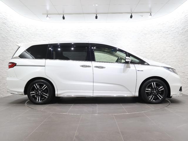 オデッセイハイブリッド ハイブリッドアブソルート・ホンダセンシング 純正ナビ バックカメラ 両側パワースライドドア 電動シート オットマン ウォークスルー ETC LEDライト フォグ 純正AW スマートキー サイドカーテンエアバック リアカメラ Pシート ABS(23枚目)