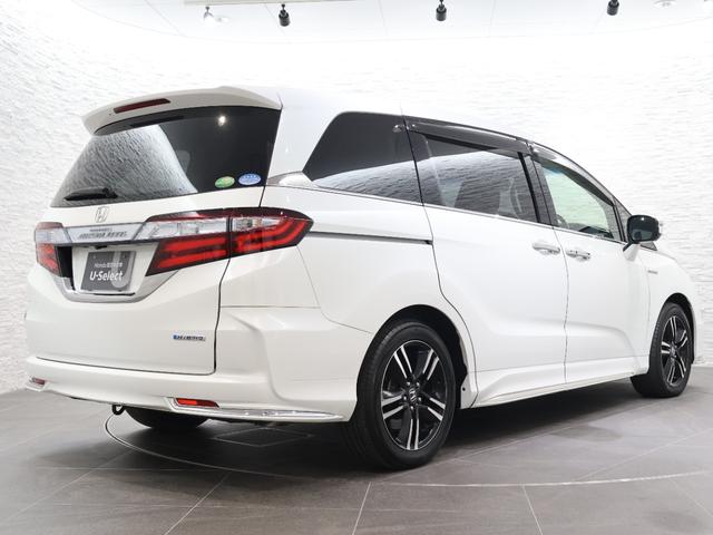 オデッセイハイブリッド ハイブリッドアブソルート・ホンダセンシング 純正ナビ バックカメラ 両側パワースライドドア 電動シート オットマン ウォークスルー ETC LEDライト フォグ 純正AW スマートキー サイドカーテンエアバック リアカメラ Pシート ABS(24枚目)