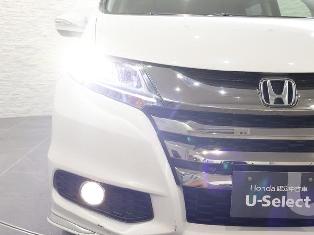 オデッセイハイブリッド ハイブリッドアブソルート・ホンダセンシング 純正ナビ バックカメラ 両側パワースライドドア 電動シート オットマン ウォークスルー ETC LEDライト フォグ 純正AW スマートキー サイドカーテンエアバック リアカメラ Pシート ABS(28枚目)