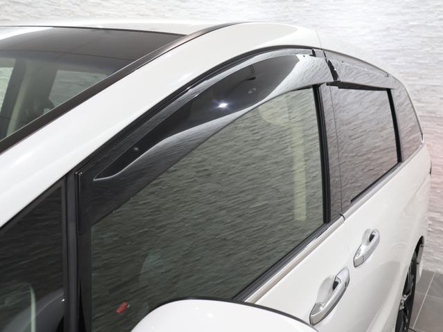 オデッセイハイブリッド ハイブリッドアブソルート・ホンダセンシング 純正ナビ バックカメラ 両側パワースライドドア 電動シート オットマン ウォークスルー ETC LEDライト フォグ 純正AW スマートキー サイドカーテンエアバック リアカメラ Pシート ABS(29枚目)