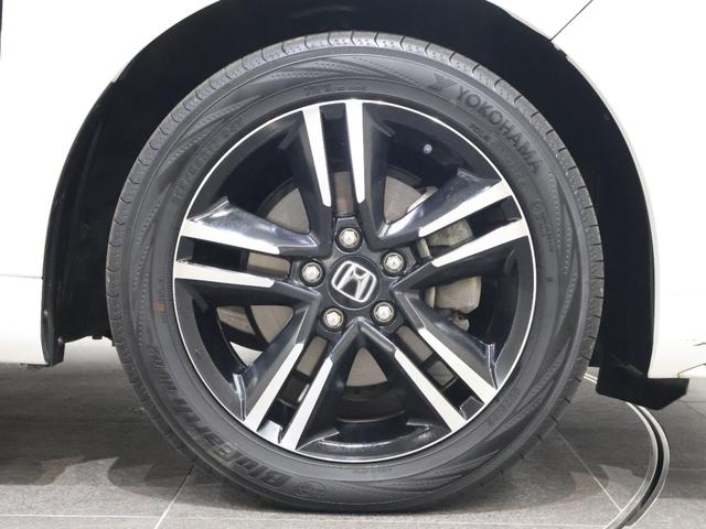 オデッセイハイブリッド ハイブリッドアブソルート・ホンダセンシング 純正ナビ バックカメラ 両側パワースライドドア 電動シート オットマン ウォークスルー ETC LEDライト フォグ 純正AW スマートキー サイドカーテンエアバック リアカメラ Pシート ABS(30枚目)