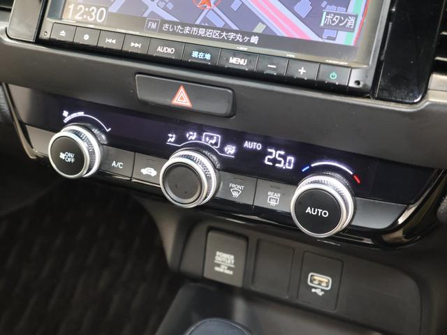 フィット ｅ：ＨＥＶホーム　純正ナビ　バックカメラ　パーキングセンサー　横滑り防止　ＥＴＣ　ＬＥＤライト　純正ＳＷ　スマートキー　前後誤発進抑制機能　クリソナ　助手席エアバッグ　運転席エアバッグ　アイドリングストップ　ＵＳＢ接続（9枚目）