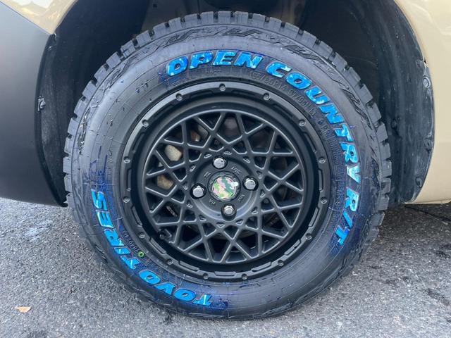 サクシード ＵＬ－Ｘ　４ＷＤ／ベージュ全塗装済／プレミアプラチナ保証１年付／純正ナビＴＶ／新品マッドヴァンスＸタイプＳ　１４インチアルミ／新品オープンカントリーＲＴタイヤ／衝突軽減ブレーキ／整備記録簿９枚付／キーレスキー（58枚目）