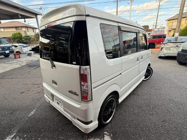 エブリイワゴン PZターボスペシャル プレミアゴールド保証1年付/社外ナビ/フルセグTV/両側自動ドア/オートステップ/フォグランプ/HID/新品ロクサーニ マルチフォルケッタ 16インチアルミ/社外エアロ/整備記録簿2枚(8枚目)