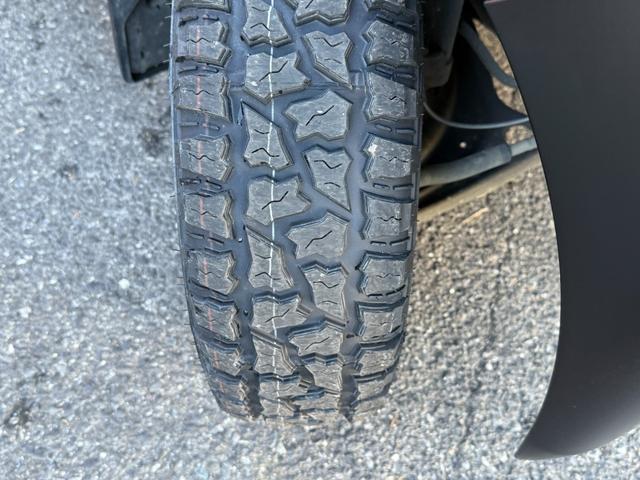 ＮＶ１００クリッパーバン ＤＸ　ＧＬパッケージ　アイビーグリーンメタリック全塗装済／プレミアプラチナ保証１年付／社外ナビ／ＴＶ／新品ヴェルザンディ　１４インチアルミ／新品マックストレックＲＴタイヤ／キーレスキー／２ｎｄ発進／整備記録簿２枚（16枚目）