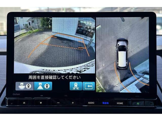 オデッセイハイブリッド ｅ：ＨＥＶアブソルート・ＥＸ　１１．４型純正ナビ　ＥＴＣ２．０　全方位カメラ　両側自動スライドドア　パワーバックドア　ホンダセンシング　ＡｎｄｒｏｉｄＡｕｔｏ　ＡｐｐｌｅＣａｒｐｌａｙ　１．２列目シートヒーター　シートエアコン（4枚目）