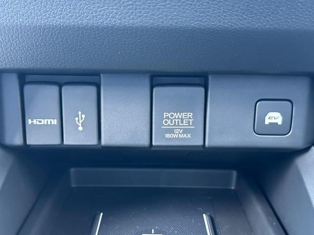 オデッセイハイブリッド ｅ：ＨＥＶアブソルート・ＥＸ　１１．４型純正ナビ　ＥＴＣ２．０　全方位カメラ　両側自動スライドドア　パワーバックドア　ホンダセンシング　ＡｎｄｒｏｉｄＡｕｔｏ　ＡｐｐｌｅＣａｒｐｌａｙ　１．２列目シートヒーター　シートエアコン（26枚目）