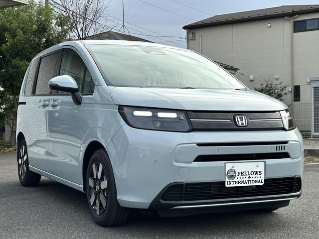 フリード ｅ：ＨＥＶエアー　ＥＸ　９インチホンダ純正コネクトナビ　マルチビューカメラ　ＥＴＣ　Ａｐｐｌｅｃａｒｐｌａｙ　ａｎｄｒｏｉｄａｕｔｏ　フルセグ（9枚目）