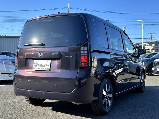 フリード ｅ：ＨＥＶエアー　ＥＸ　９インチホンダ純正コネクトナビ　バックカメラ　ＥＴＣ　Ａｐｐｌｅｃａｒｐｌａｙ　ａｎｄｒｏｉｄａｕｔｏ　フルセグ　保証継承付き（12枚目）