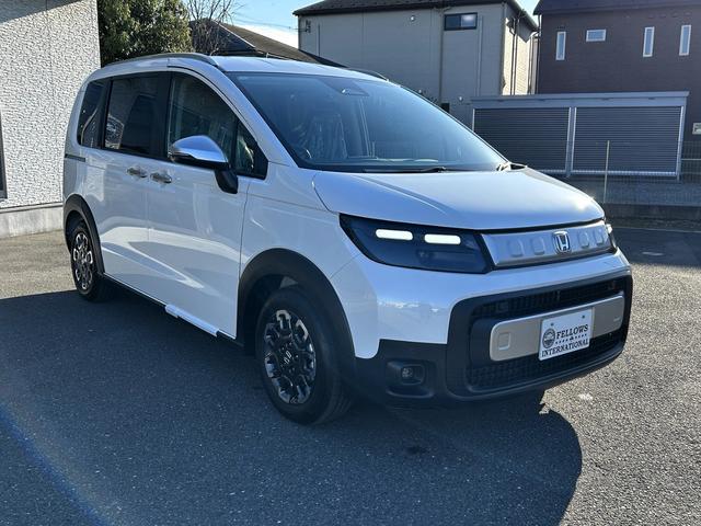 フリード ｅ：ＨＥＶクロスター　純正９インチコネクトナビ　バックカメラ　ＥＴＣ　リアクーラー　ＡｐｐｌｅＣａｒＰｌａｙ／ＡｎｄｒｏｉｄＡｕｔｏ対応　シートヒーター　両側パワースライド（9枚目）