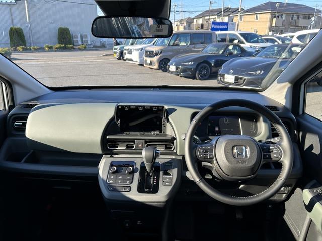 フリード ｅ：ＨＥＶクロスター　純正９インチコネクトナビ　バックカメラ　ＥＴＣ　リアクーラー　ＡｐｐｌｅＣａｒＰｌａｙ／ＡｎｄｒｏｉｄＡｕｔｏ対応　シートヒーター　両側パワースライド（21枚目）