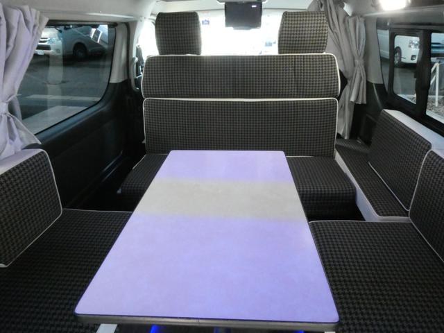 ハイエースワゴン 東和モータース ツェルトWG キャンピングカー 3ナンバー シングルサブバッテリー 走行充電 外部充電 フリップダウンモニター リアヒーター リアクーラー フロントモデリスタスポイラー 10人乗車3人就寝 メモリーナビ ETC(3枚目)