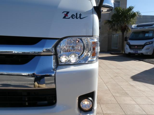 ハイエースワゴン 東和モータース ツェルトWG キャンピングカー 3ナンバー シングルサブバッテリー 走行充電 外部充電 フリップダウンモニター リアヒーター リアクーラー フロントモデリスタスポイラー 10人乗車3人就寝 メモリーナビ ETC(47枚目)