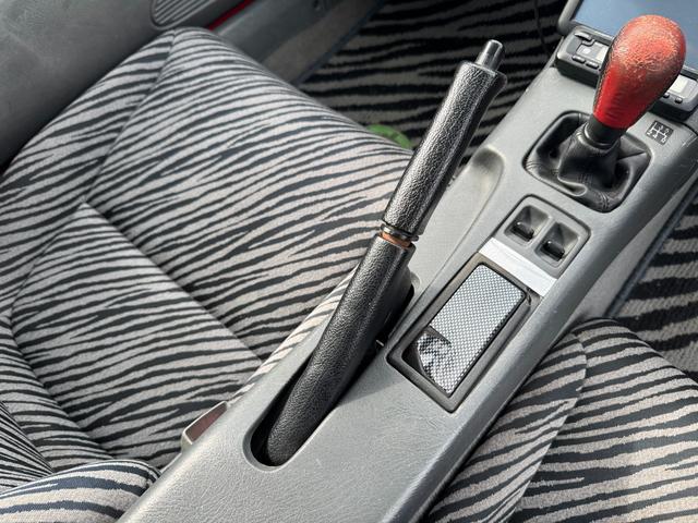 ビート ベースグレード FUJITSUBOマフラー FAEROタワーバー リアスポイラー 純正14インチAW 社外ステアリング 純正シート ソフトトップ 幌破れ無し(31枚目)