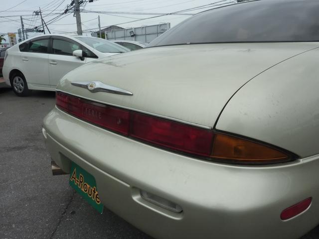 レパードＪ．フェリー タイプＬ　現状販売車　バットフェイス加工ボンネット　車高調　ベージュ革シート　実走行６４，９９６ｋｍ　１９インチアルミ　爆音マフラー　タイミングベルト交換済み　ウッドパネル＆ウッドＭＯＭＯステ（32枚目）