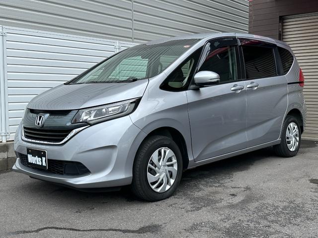 フリード Ｇ・ホンダセンシング　両側オートスライド　純正ナビ　フルセグ　ＥＴＣ　バックカメラ　ＡＣＣ　ホンダセンシング　ＬＥＤヘッドライト　走行中ＴＶ映ります　シートヒーター　スマートキー　スペアキー（8枚目）