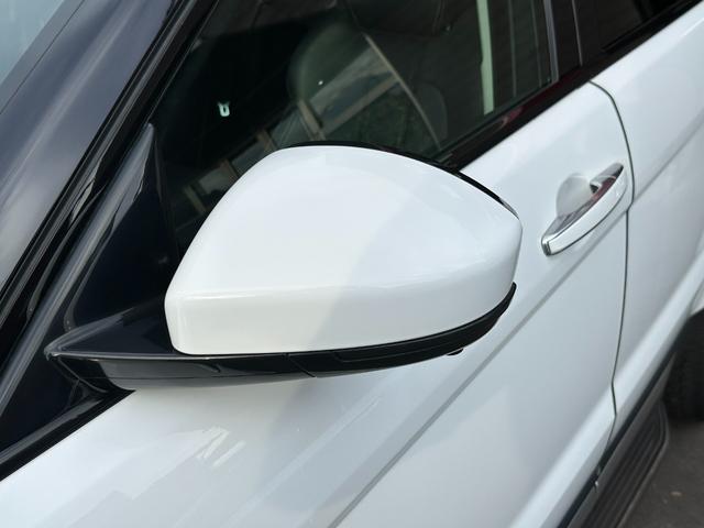 レンジローバーイヴォーク プレステージ　純正ナビ　ガラスルーフ　レザーシート　Ｆ・Ｓ・Ｒカメラ　ＥＴＣ　クルーズコントロール　ＨＩＤヘッドライト　ＭＥＲＩＤＩＡＭスピーカー　障害物センサー　パワーバックドア　シートヒーター　スマートキー（14枚目）