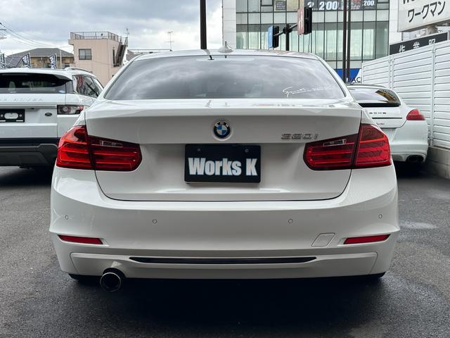 ３シリーズ ３２０ｉ　スポーツ　サンルーフ　純正ナビ　Ｂカメラ　ＥＴＣ　クルコン　ＨＩＤヘッドライト　社外サスペンション　フロントスポイラー　スマートキー　スペアキー　障害物センサー　レーダー探知機　パワーシート（2枚目）