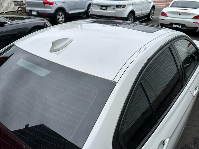 ３シリーズ ３２０ｉ　スポーツ　サンルーフ　純正ナビ　Ｂカメラ　ＥＴＣ　クルコン　ＨＩＤヘッドライト　社外サスペンション　フロントスポイラー　スマートキー　スペアキー　障害物センサー　レーダー探知機　パワーシート（12枚目）