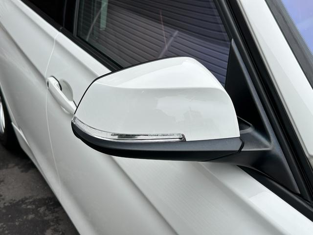 ３シリーズ ３２０ｉ　スポーツ　サンルーフ　純正ナビ　Ｂカメラ　ＥＴＣ　クルコン　ＨＩＤヘッドライト　社外サスペンション　フロントスポイラー　スマートキー　スペアキー　障害物センサー　レーダー探知機　パワーシート（13枚目）