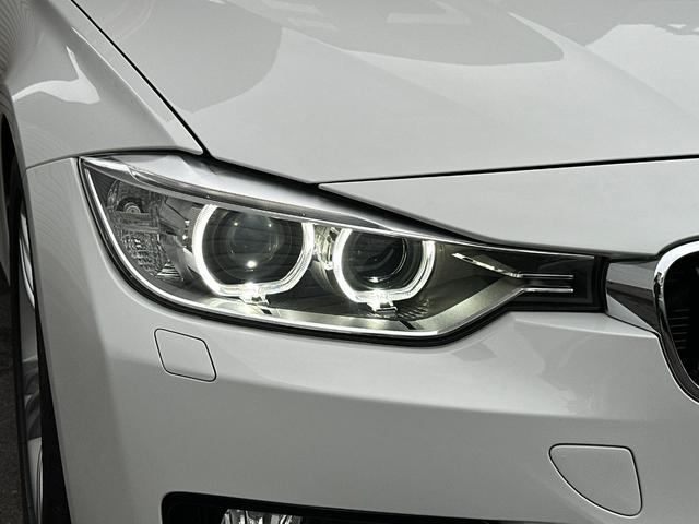 ３シリーズ ３２０ｉ　スポーツ　サンルーフ　純正ナビ　Ｂカメラ　ＥＴＣ　クルコン　ＨＩＤヘッドライト　社外サスペンション　フロントスポイラー　スマートキー　スペアキー　障害物センサー　レーダー探知機　パワーシート（16枚目）