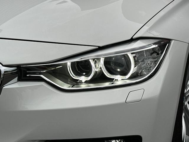 ３シリーズ ３２０ｉ　スポーツ　サンルーフ　純正ナビ　Ｂカメラ　ＥＴＣ　クルコン　ＨＩＤヘッドライト　社外サスペンション　フロントスポイラー　スマートキー　スペアキー　障害物センサー　レーダー探知機　パワーシート（17枚目）