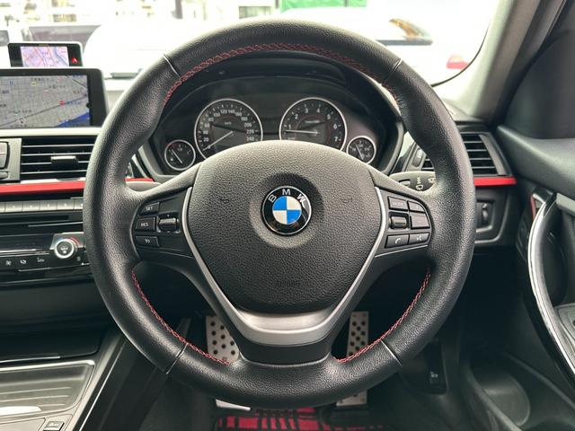 ３シリーズ ３２０ｉ　スポーツ　サンルーフ　純正ナビ　Ｂカメラ　ＥＴＣ　クルコン　ＨＩＤヘッドライト　社外サスペンション　フロントスポイラー　スマートキー　スペアキー　障害物センサー　レーダー探知機　パワーシート（30枚目）