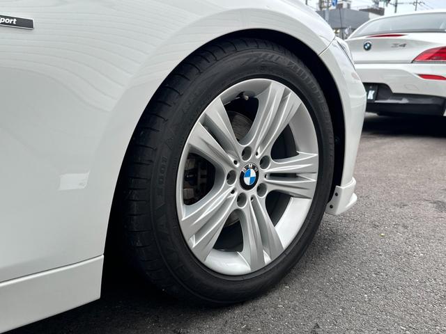 ３シリーズ ３２０ｉ　スポーツ　サンルーフ　純正ナビ　Ｂカメラ　ＥＴＣ　クルコン　ＨＩＤヘッドライト　社外サスペンション　フロントスポイラー　スマートキー　スペアキー　障害物センサー　レーダー探知機　パワーシート（62枚目）